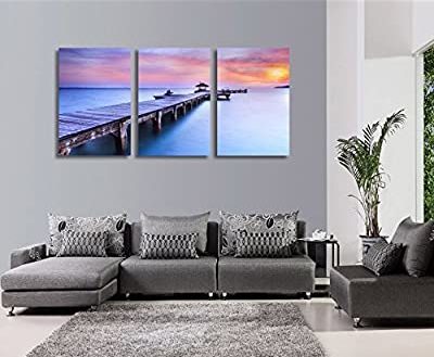 ideal living room with ocean canvas art