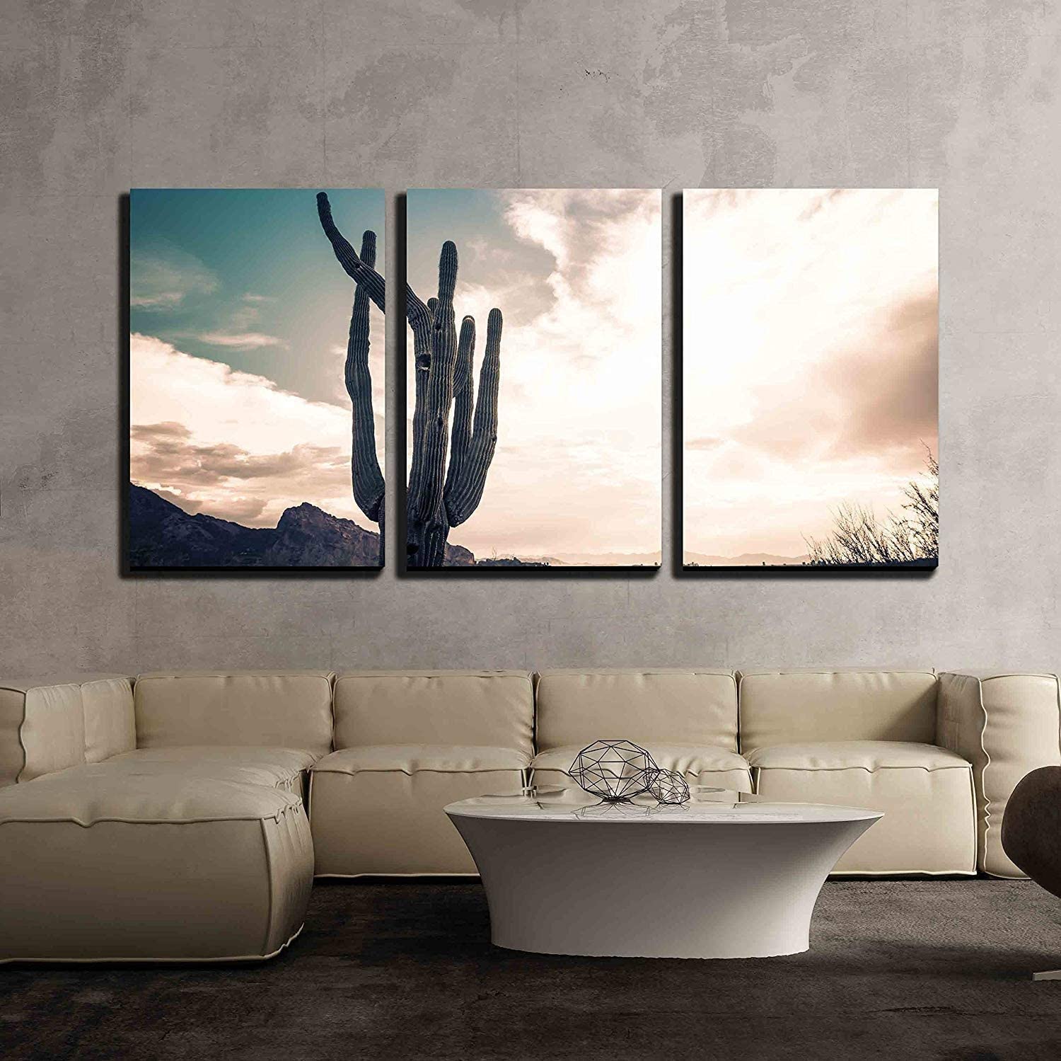 classic saguaro over a leather couch cactus themed room