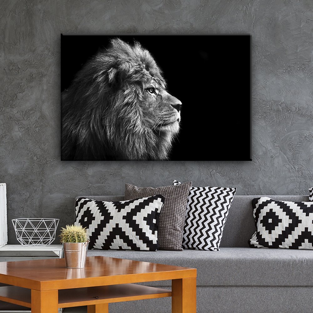 a majestic lion on canvas and a finished wooden table making up a fancy living room