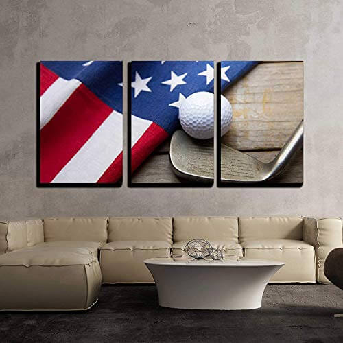 wall art of a golf ball and club next to an American flag