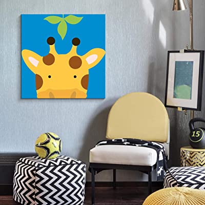 blue artwork in a giraffe themed baby room
