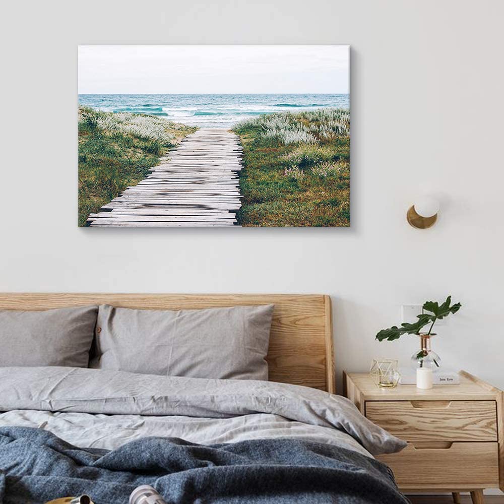 a walkway leading to the ocean on canvas over a bed setting vibe