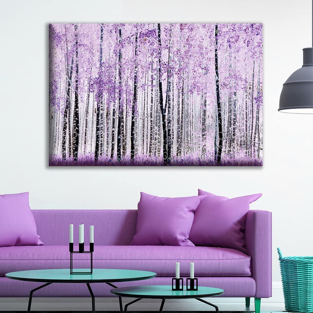 purple birch trees featured in wall art above a purple couch as small apartment decorating ideas