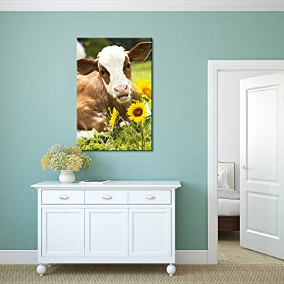 cow with a sunflower art on the wall