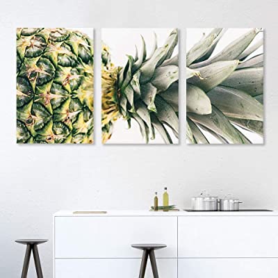 a huge 3-panel canvas featuring image art for a pineapple themed room