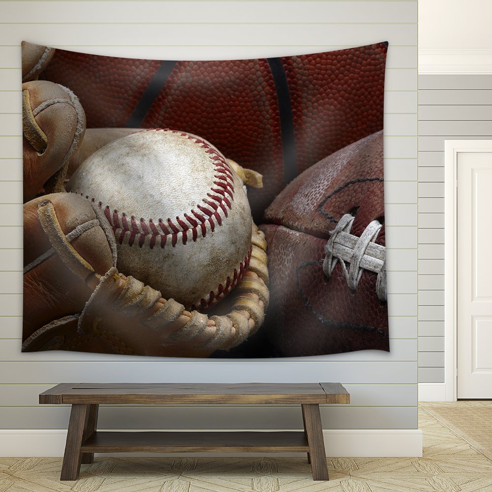 sport themed tapistry over a bench featuring a baseball, football and basketball