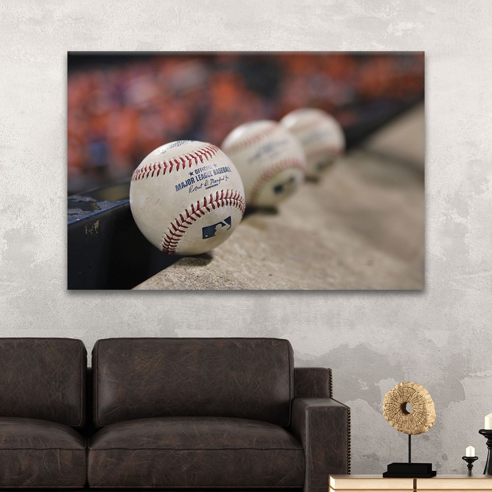 vintage balls all lined up on canvas