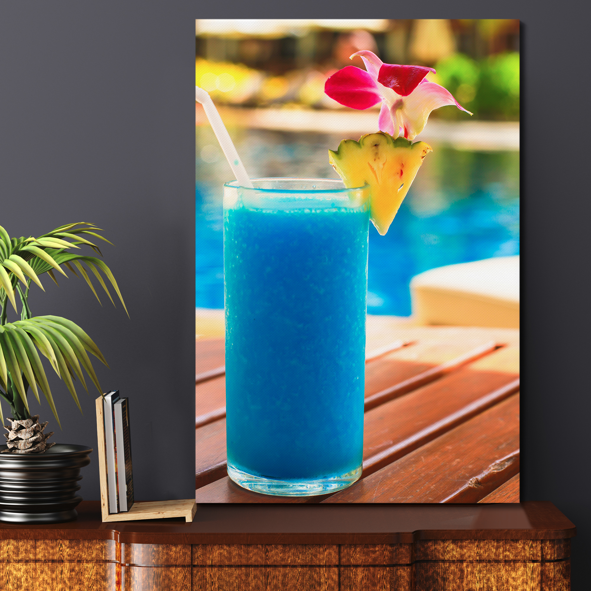canvas art featuring sluchy blue cocktail over a wood table