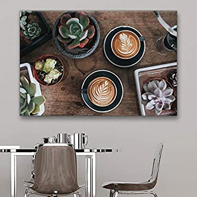 canvas art over a metal kitchen table featuring coffee and plants for coffee decor ideas