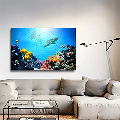 canvas art featuring sharks swimming over a reef