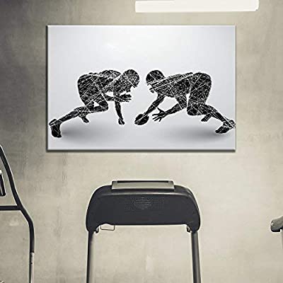 black and white football art over a treadmill for a football themed room