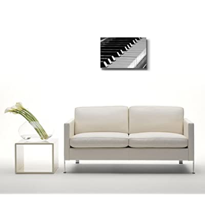piano keys on canvas on a white wall over a white sofa