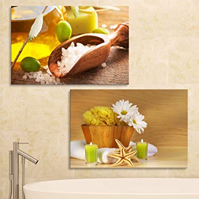 great bathtub with yellow and white spa art above