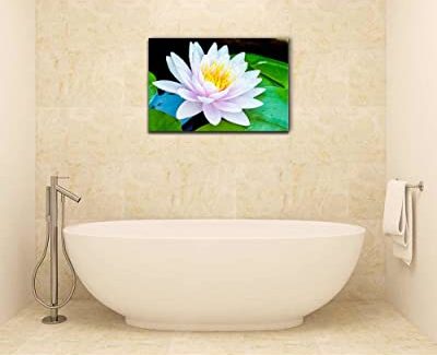 a lotus flower canvas over a bathtub