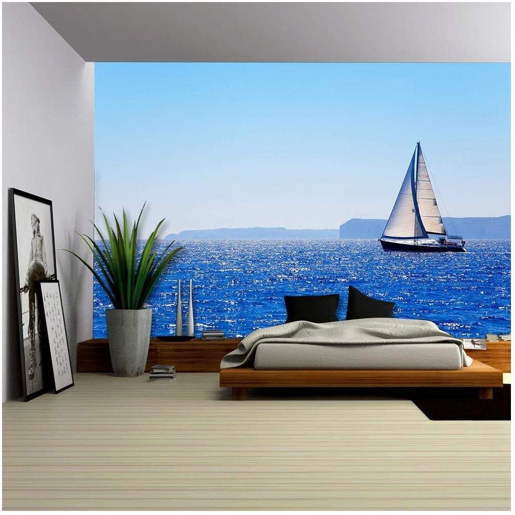 vibrant blue ocean mural featuring a sailboat