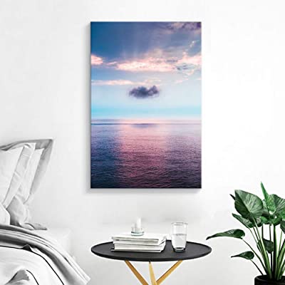 amazing ocean shot on artwork next to the bed for sea themed bedroom