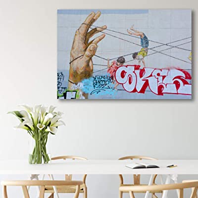 nice canvas art featuring a hand in graffiti style