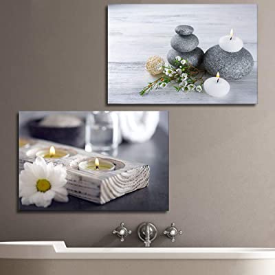 gray stones with candles for zen room ideas