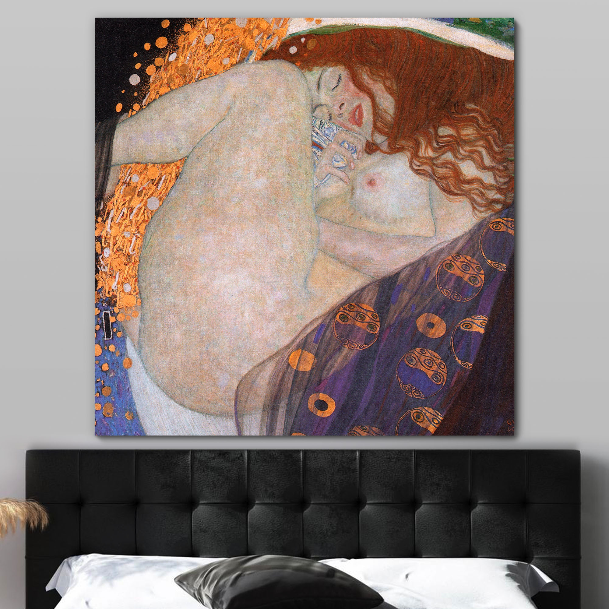Danae by klimt on the wall above a bed